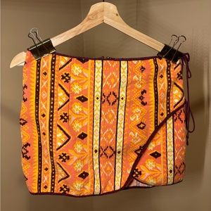 Free People size 2 mini skirt, orange / yellow / maroon pattern, side zipper